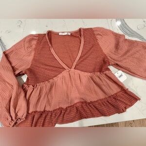 Alter’d State mauve babydoll blouse. Size M